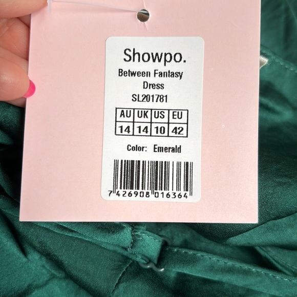 Never worn, still tagged! Beautiful emerald satin Showpo wrap dress! Size 10. - Picture 9 of 9